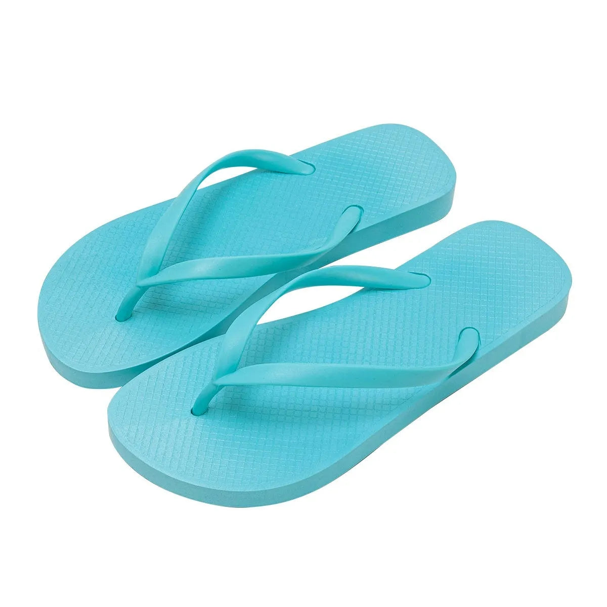 Flat casual slipper with hollow-out plastic upper and textured PVC sole in orange colour.