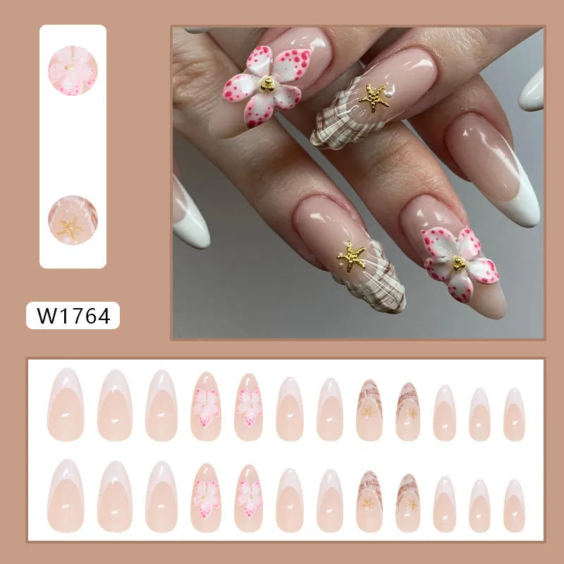 Press-on fake nails with flower French style and grey rock pattern patches on a white tip, W1764 colour.