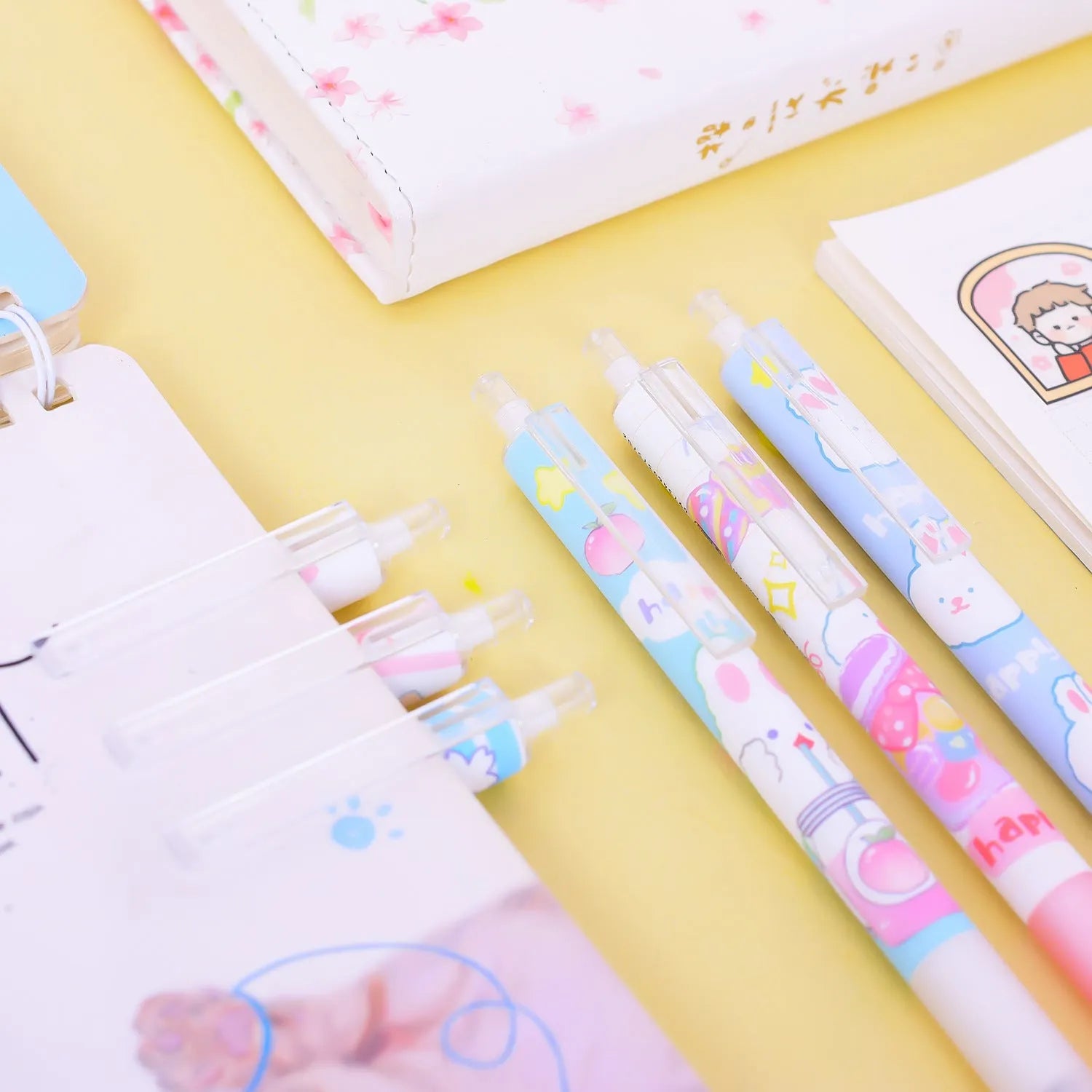 Six black pens with cartoon bunny designs and 0.5mm tips for student writing