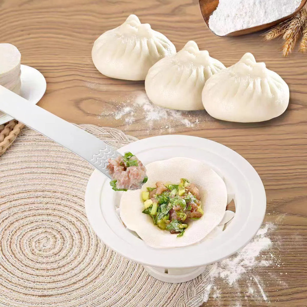 Four black steamed bun moulds for making baozi and dumplings