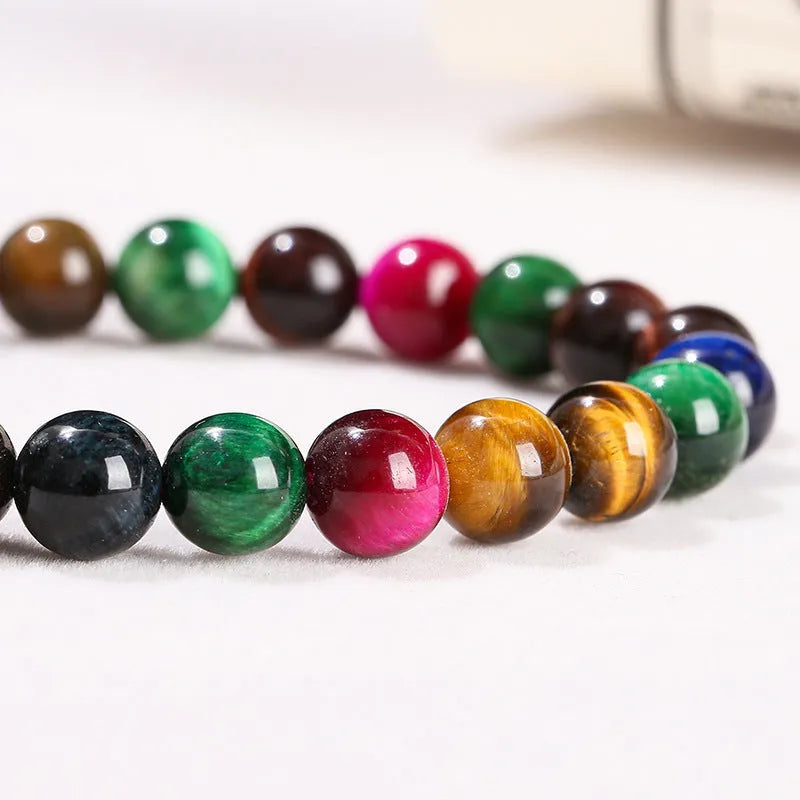 Colourful tiger-eye gemstone bead bracelet in round beads on a string.