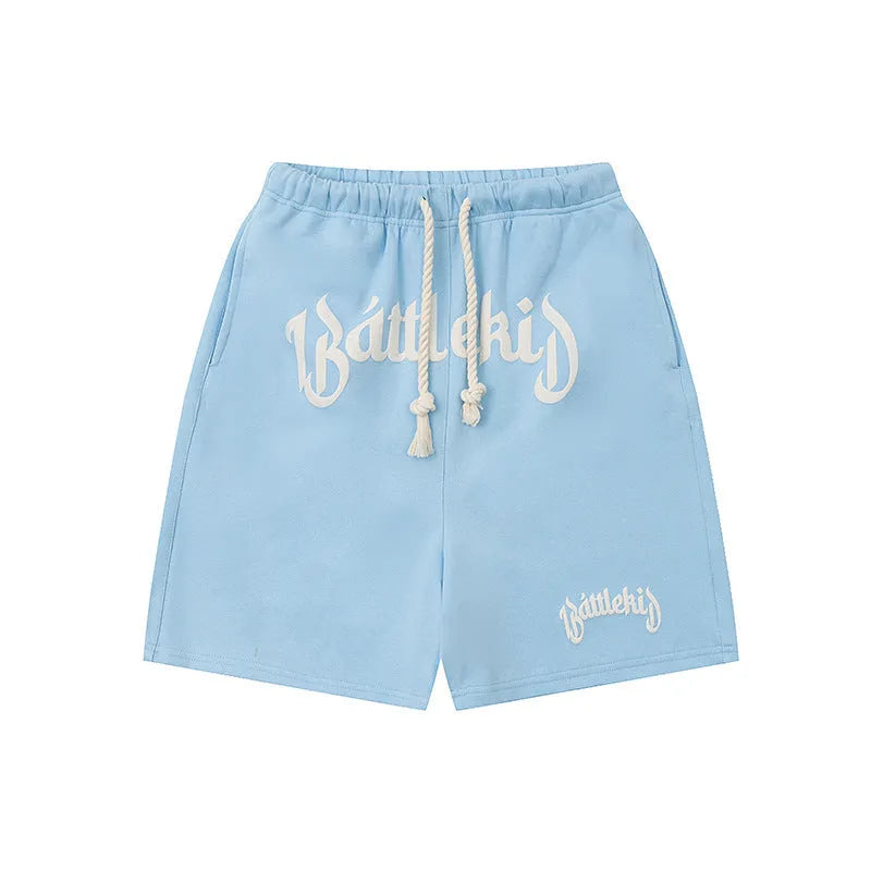 A pair of cropped, loose-fit sweatpants in a cotton blend fabric for casual streetwear.