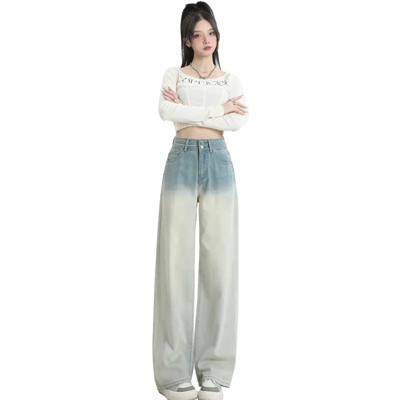 Women's gradient blue straight-leg denim trousers with wide-leg style on hanger