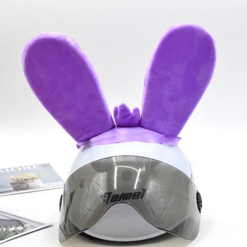 Rabbit Glow Ears helmet decoration with locomotive and ski designs on a Velcro base
