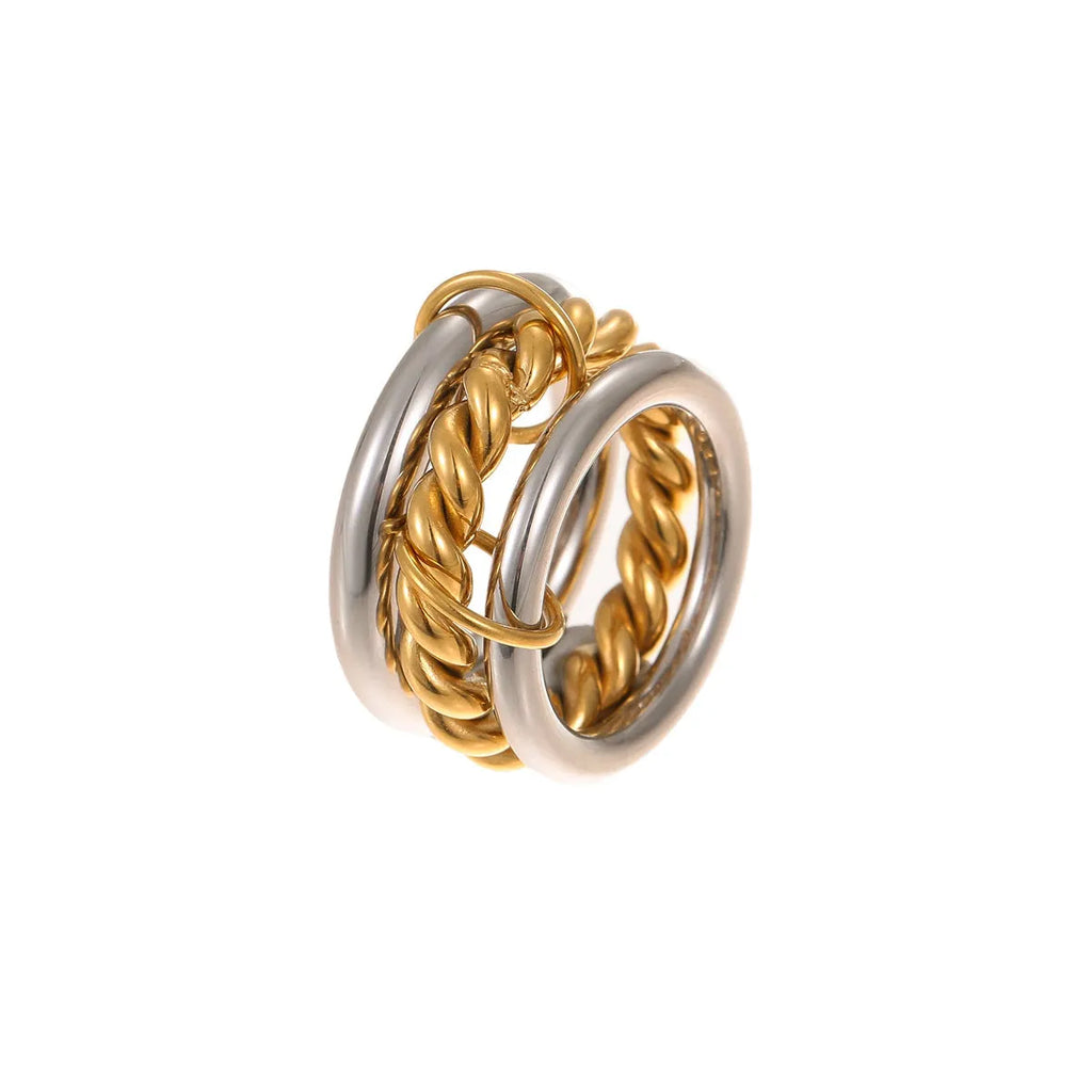Stacked colour matching stainless steel rings with 18K gold electroplating in exaggerated jewellery styles
