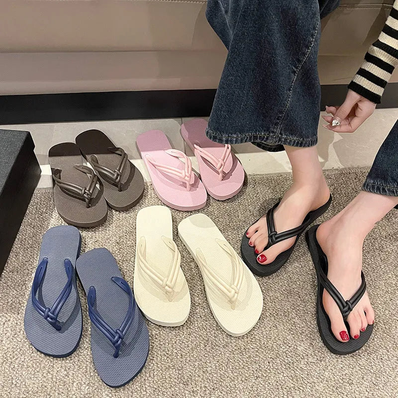 PVC casual flip flops for men with a toe-covering design and textured non-slip soles.