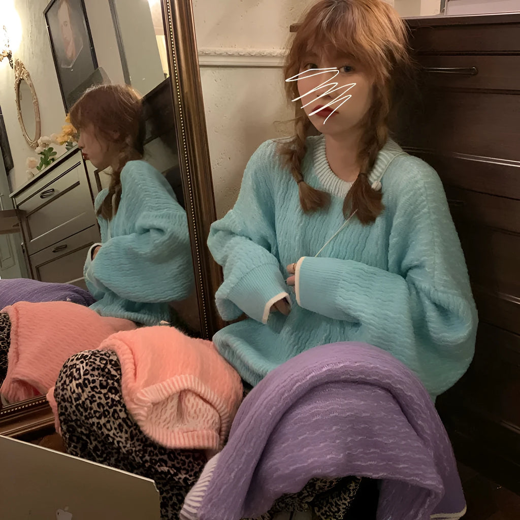 Women's loose fit pullover sweater in polyester fabric available in lake blue, purple and pink colours