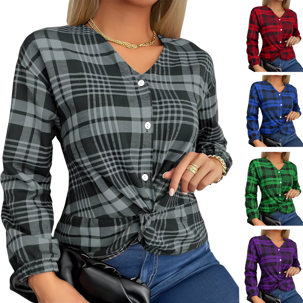Woman wearing a loose-fitting purple plaid casual shirt with regular sleeves.