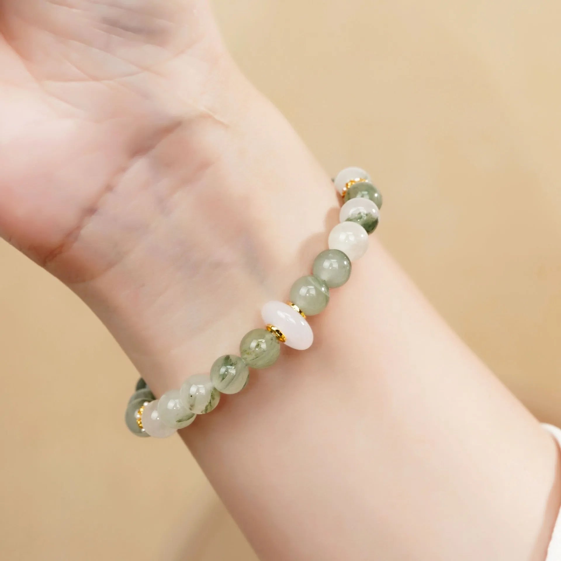 Emerald green Tian Shan Cui jade women's half bracelet with floating flower girl design and round beads