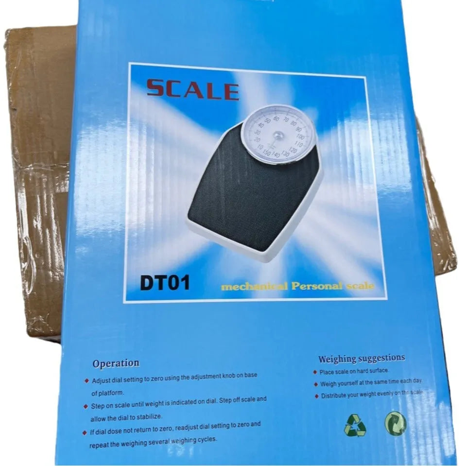 Black mechanical bathroom scale with large analogue dial on a 47x35cm platform.