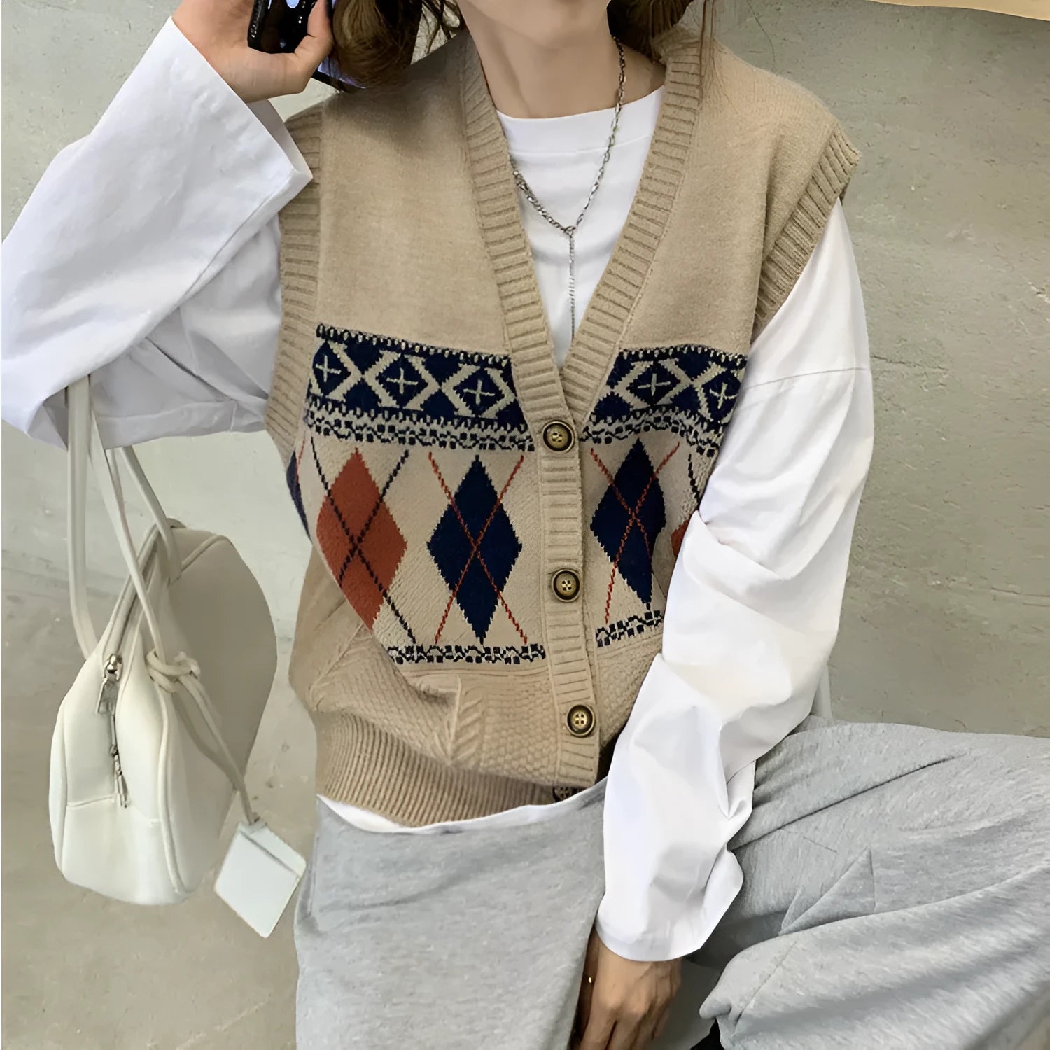 Diamond plaid pattern sleeveless cardigan top in loose free-size fit