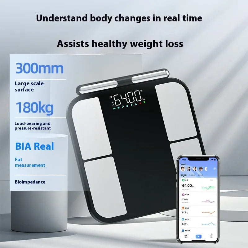 Black electronic weighing scale with tempered glass platform and colour display showing body metrics
