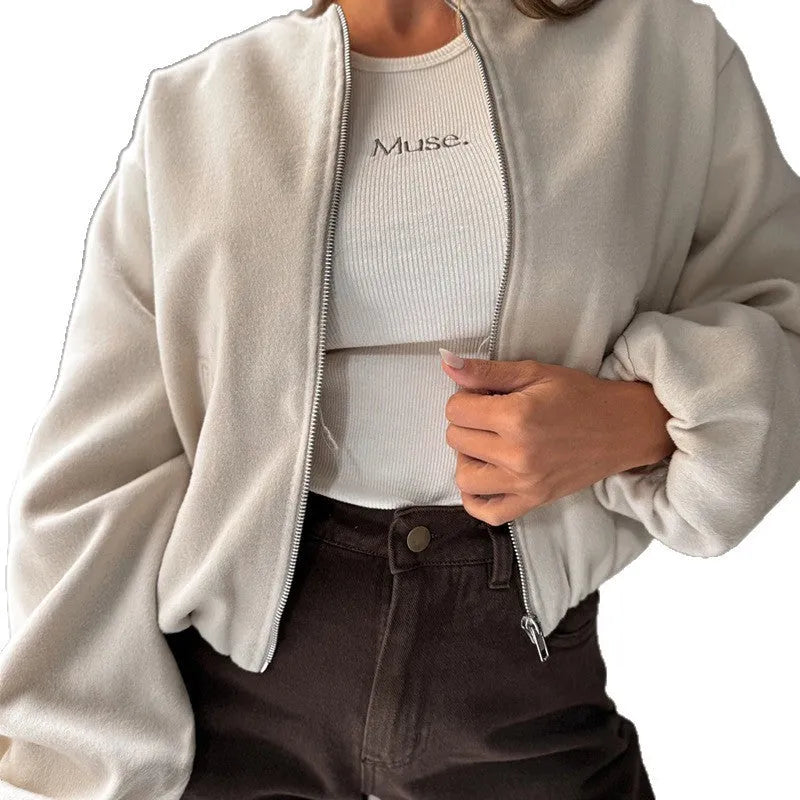 Women's off-shoulder coat with lantern sleeves in brown colour showing round neck design and pocket detail