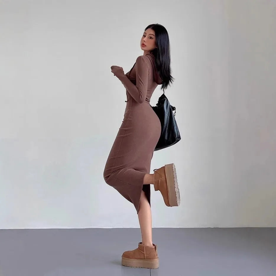 Women's long sleeve hooded sheath dress in polyester, shown in a neutral colour on a model.
