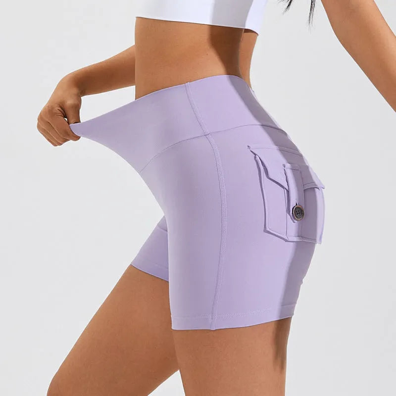 Women's high waist hip lifting shorts with pockets in various colours for fitness activities