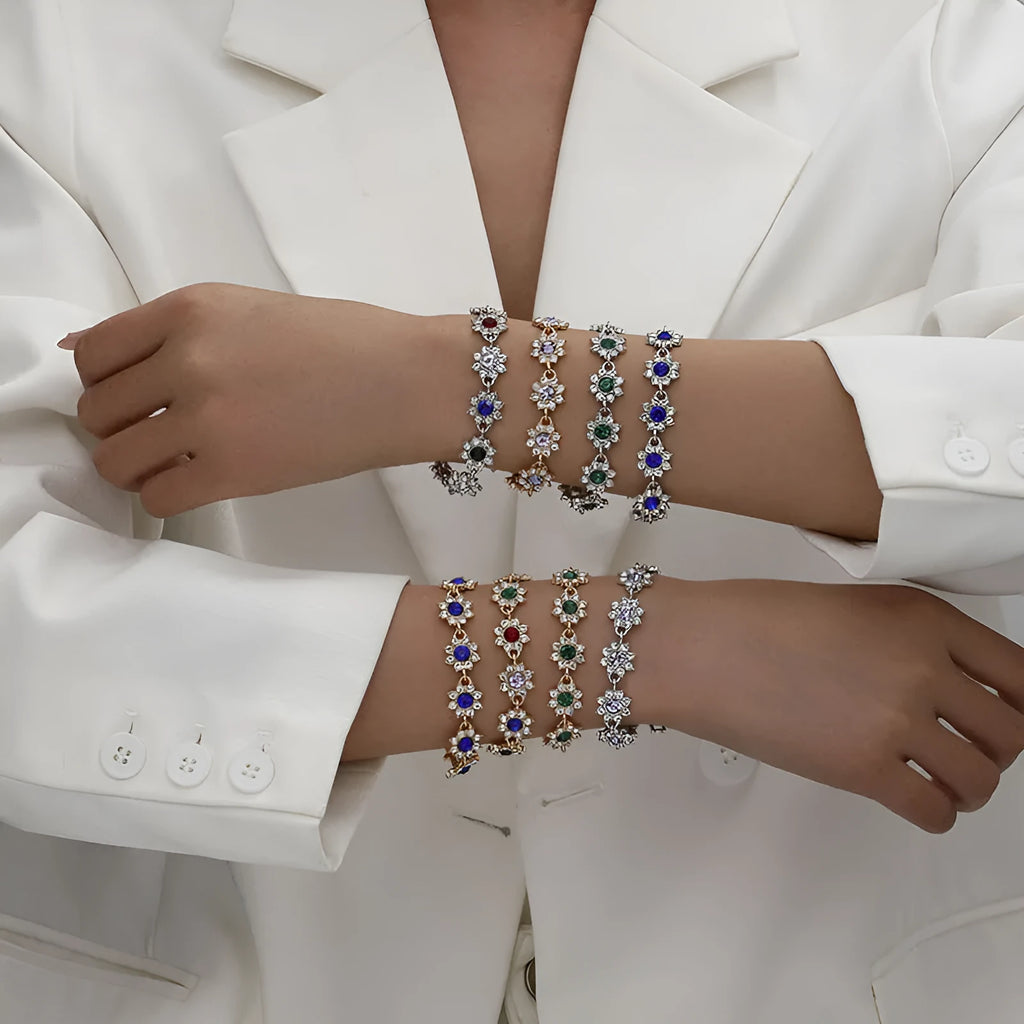Floral coloured gemstone bracelet in zinc alloy with electroplated gold and silver crystal finishes.