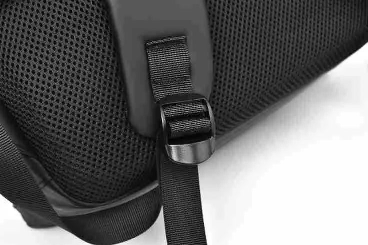 Large waterproof backpack in PU leather with sewing thread detailing and computer bag