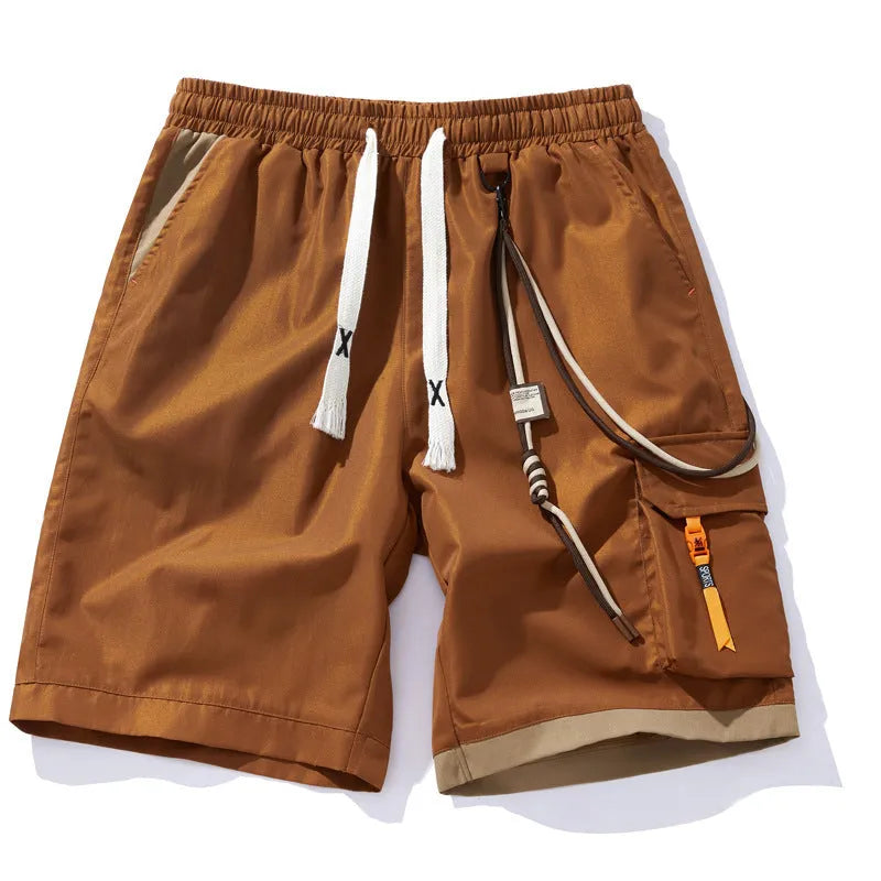 Men's plus size bamboo fibre sports shorts in a loose, cropped straight-leg style on a hanger.