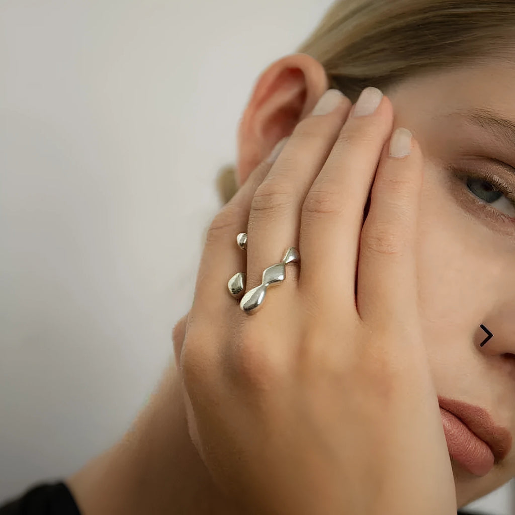 Brass adjustable opening ring with circular design in gold or silver finish for women