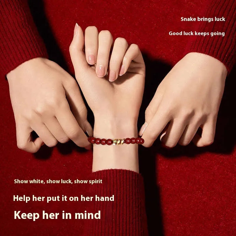 Handmade red cinnabar Snake zodiac bracelet with traditional Chinese animal motif