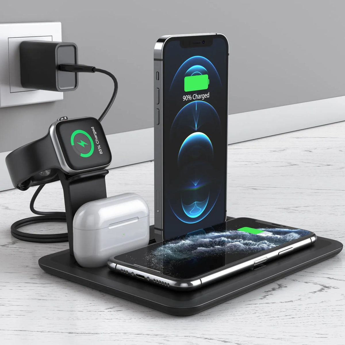 Black and white desktop wireless charger with phone pad, watch port, and headphone bracket.
