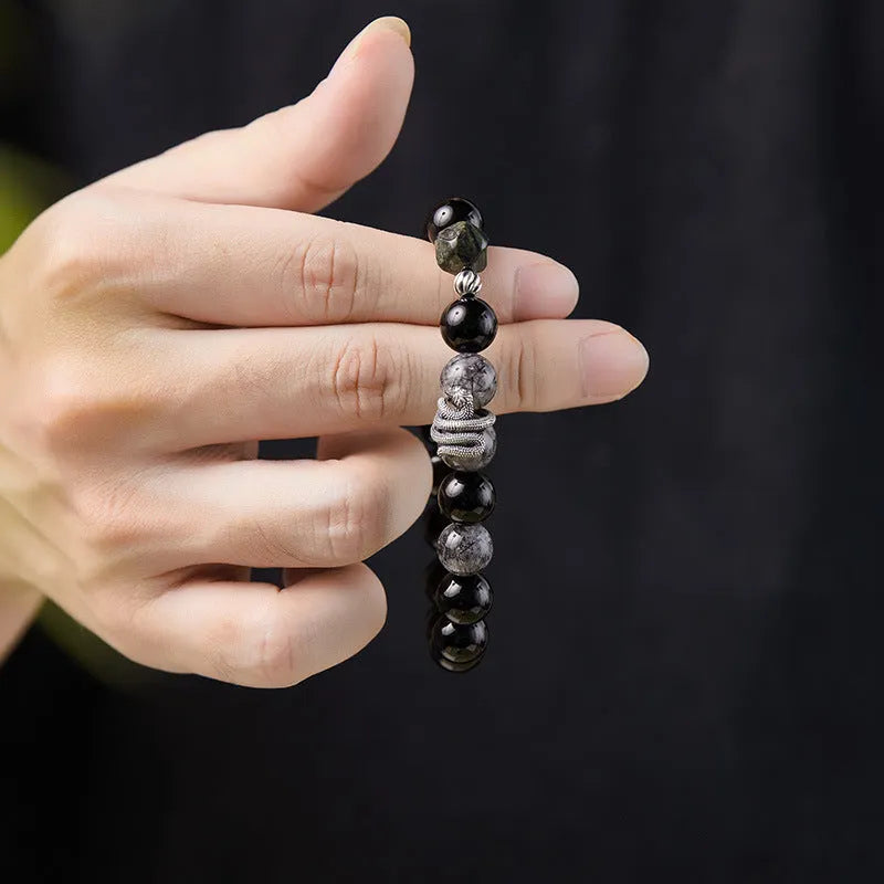 Men's black obsidian snake bracelet in S925 sterling silver with crystal hair detailing