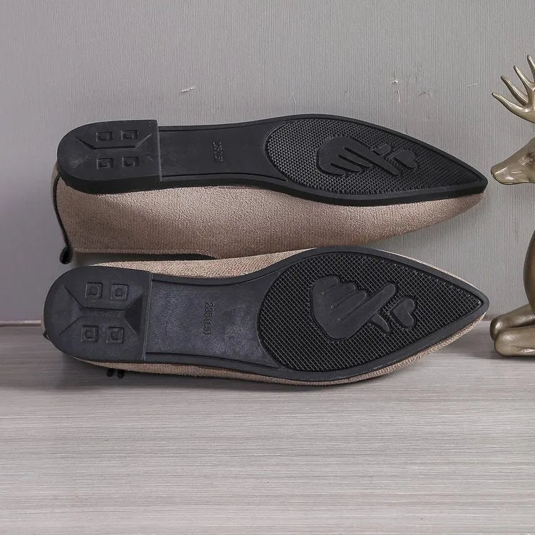 Beige leopard print women's pointed toe pumps with a faux PU upper and rubber sole.