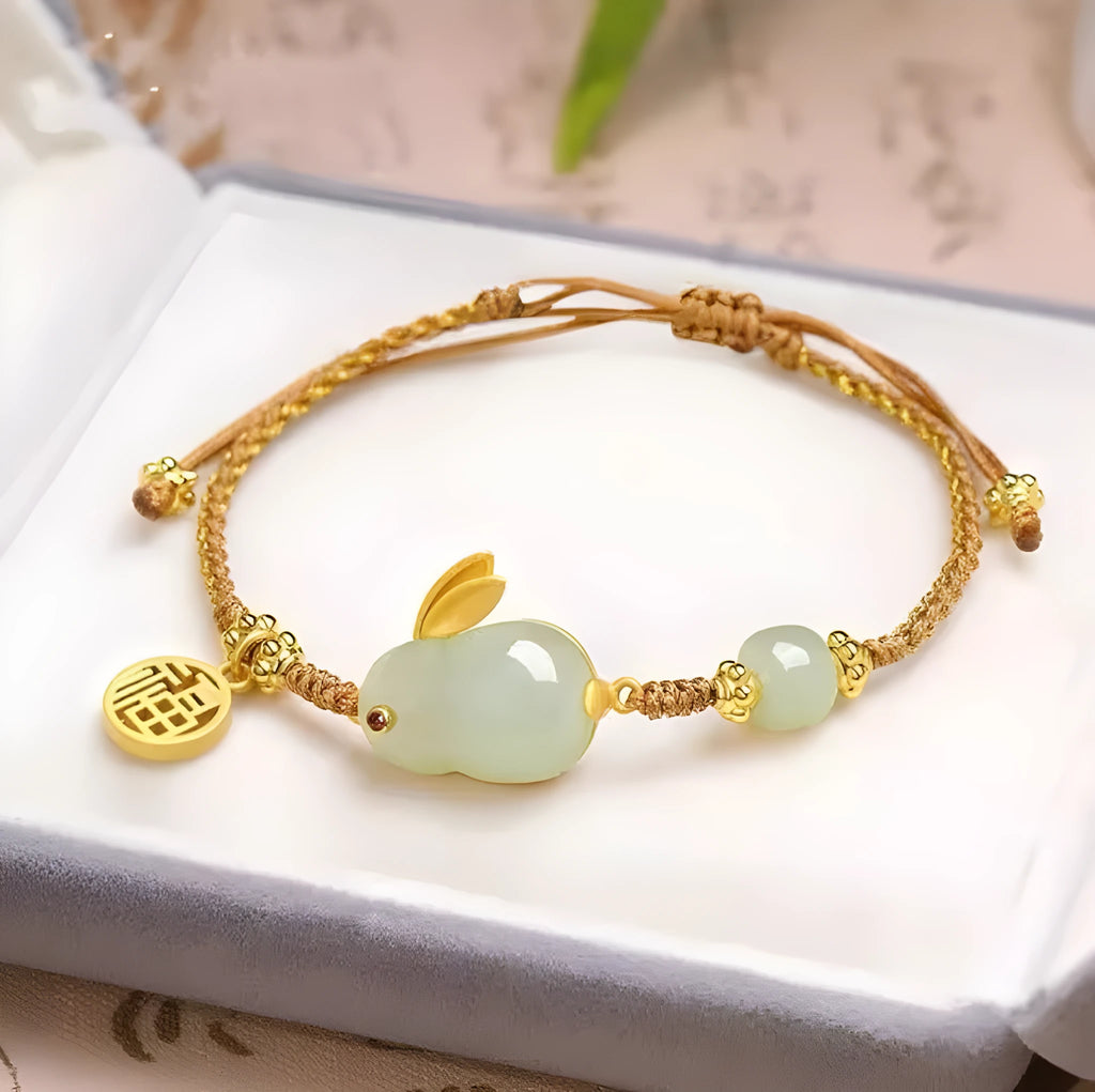 Hetian jade rabbit charm bracelet for women on a yellow string fastening