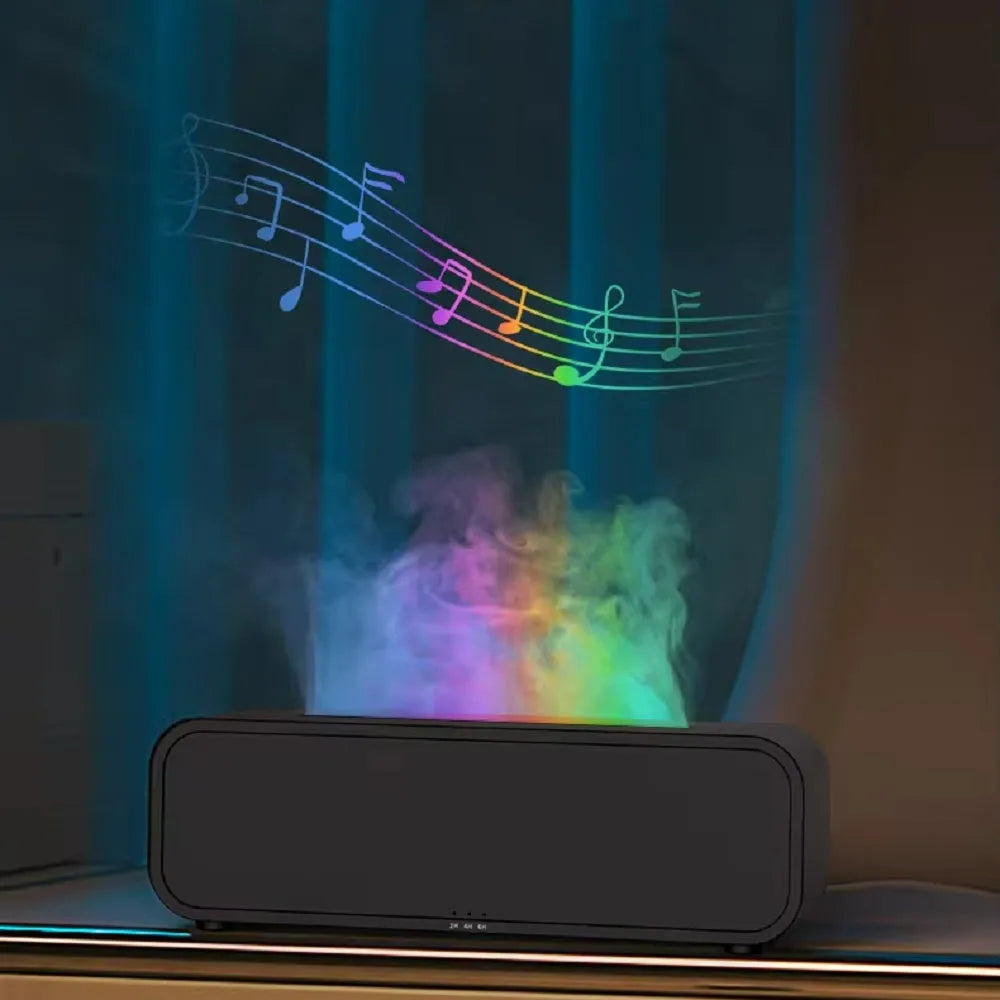 Black and white aroma diffuser with colour-changing LEDs, remote control, and USB cable.