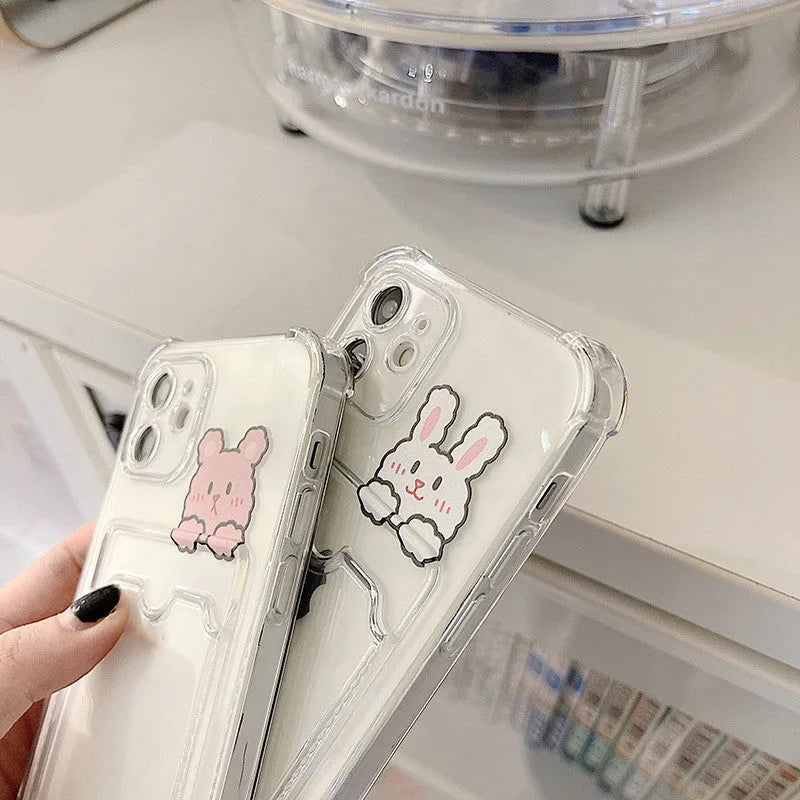 Transparent cartoon-styled iPhone case with a card holder slot on the back