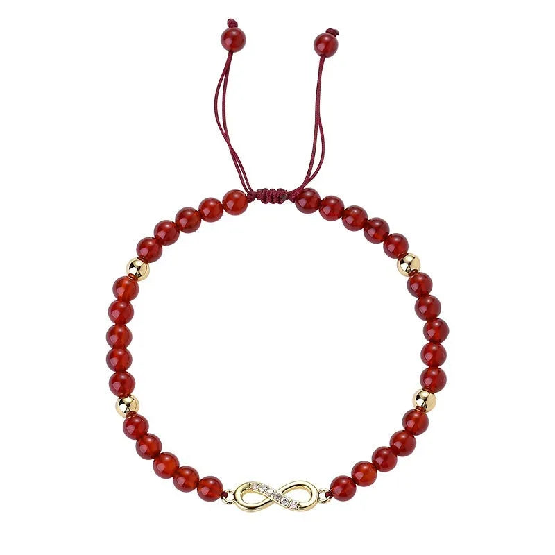 Hand-woven red agate bracelet with diamond-shaped beads and ethnic woven patterns