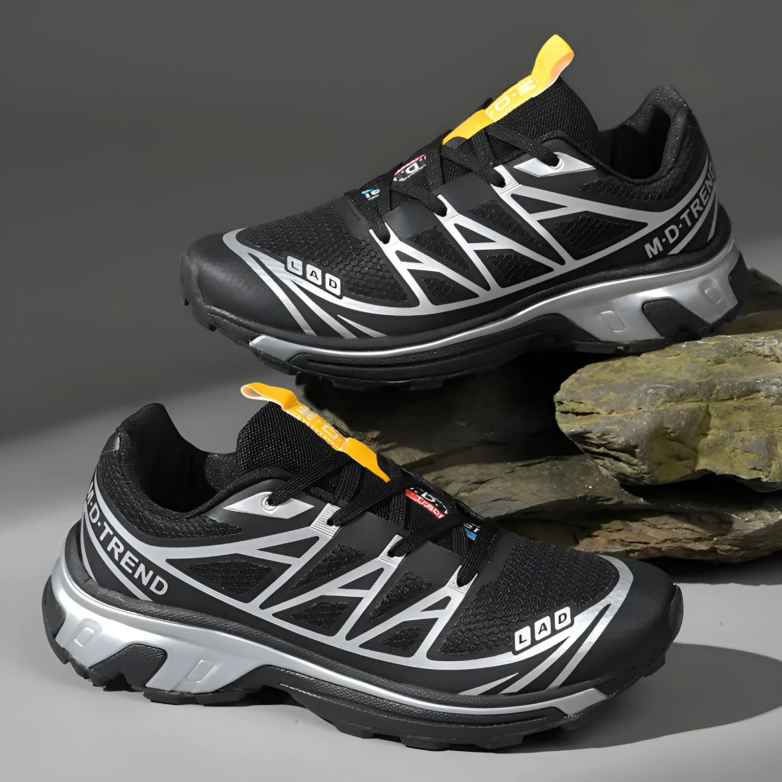 Men's and women's low-top hiking shoes in khaki colour with round toe and lace-up front.
