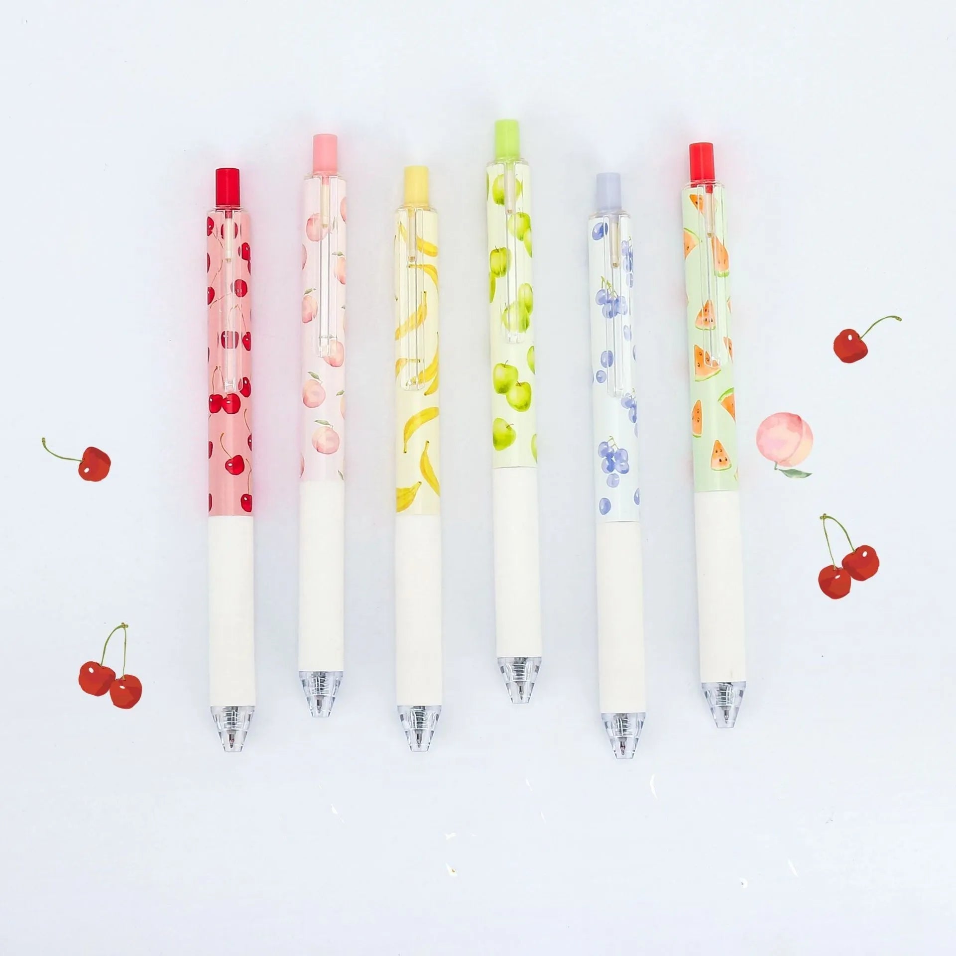 Three scented fruit flavoured press-action pens with 0.5mm black ink refills