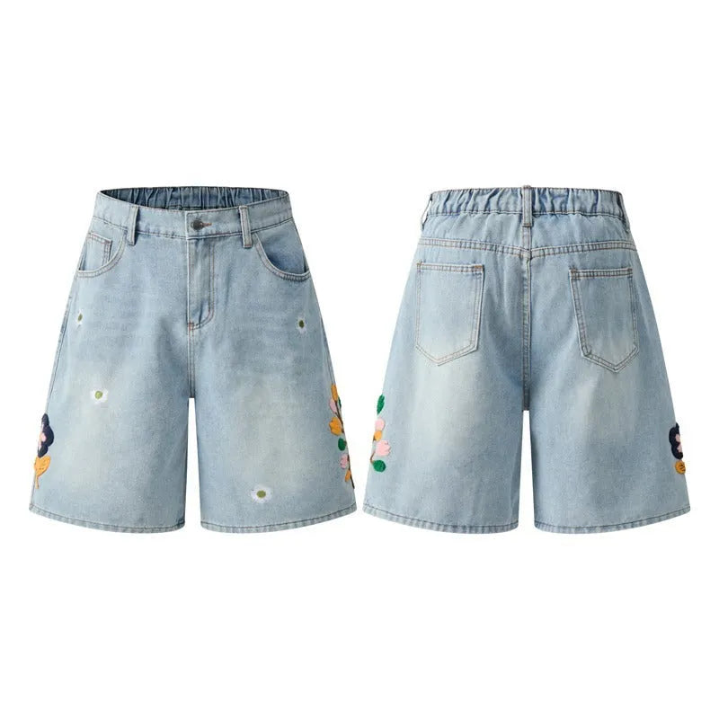 Retro loose-fit workwear shorts in washed cotton fabric with a zipper fly, shown in camouflage colour.