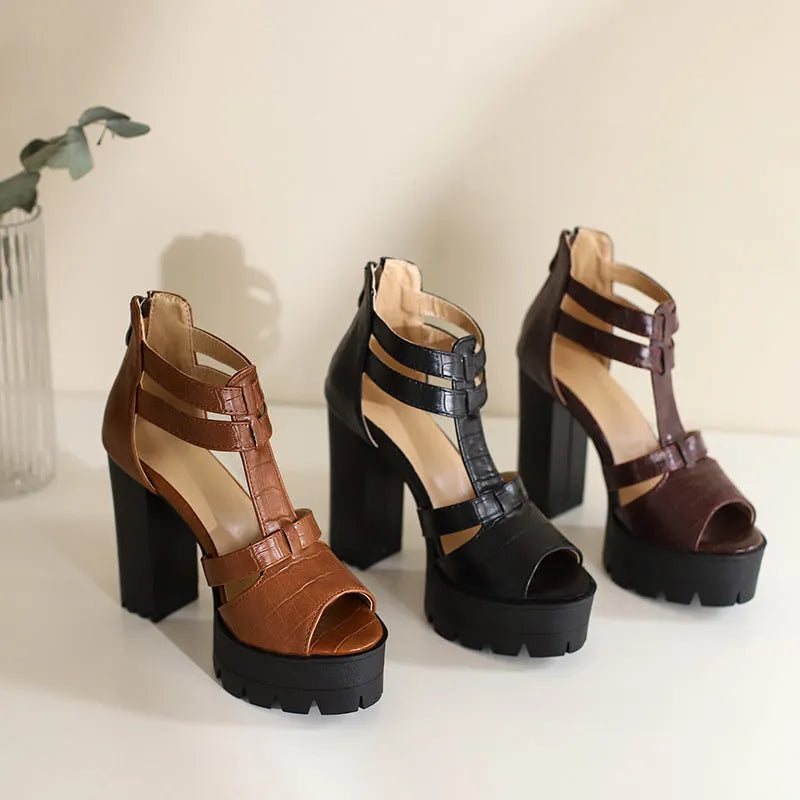Women's black platform high heel sandals with a back zipper and round toe on a rubber sole.