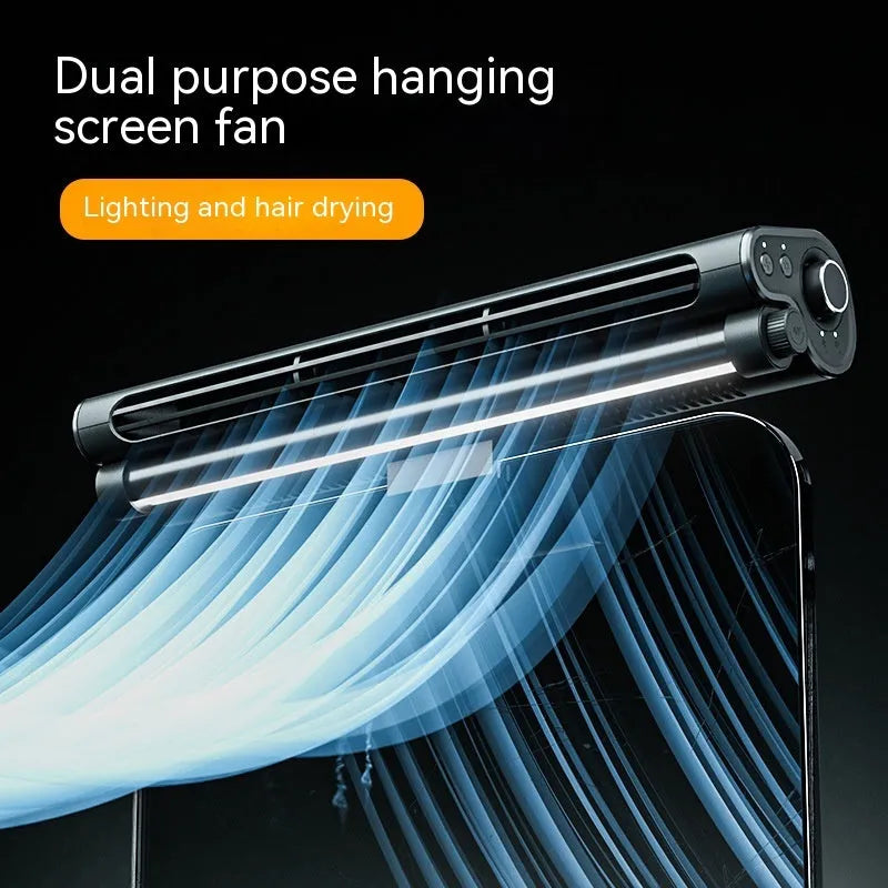 Black USB-powered bladeless clip-on fan with LED light attached to laptop screen