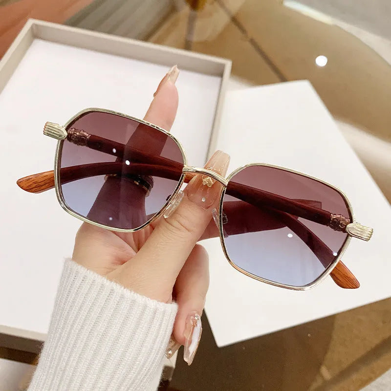 Women's frameless gold alloy frame glasses with multiple lens colour options