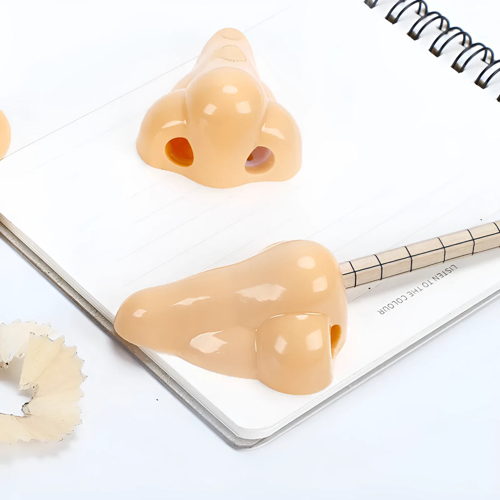 Geometry-shaped flesh colour plastic pencil sharpener with big nostril opening for standard pencils