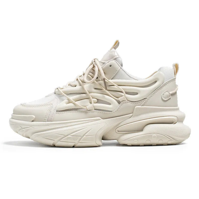 Men's beige low-top lace-up sneaker with mesh upper and platform rubber sole.