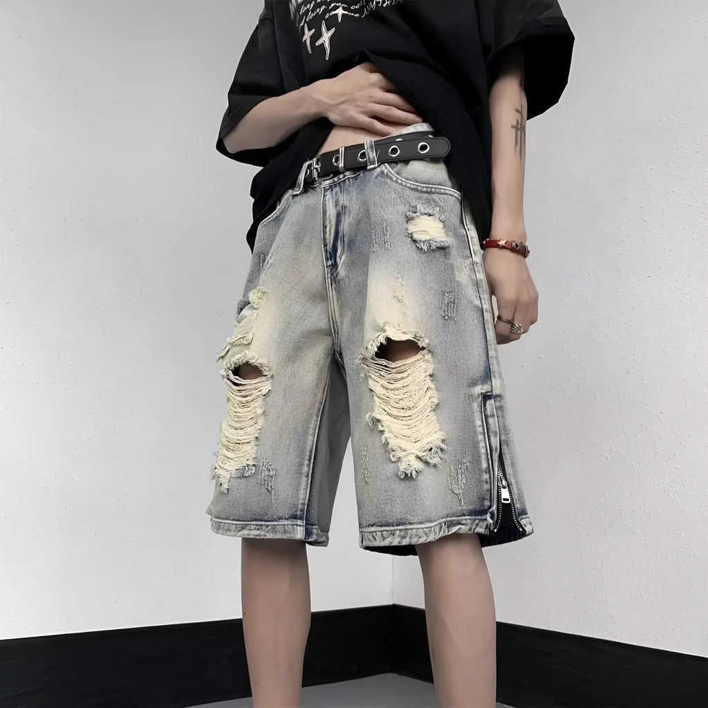 Blue retro-style denim shorts with a wide-leg, loose fit on a person.