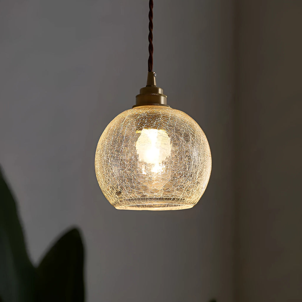 Retro brass chandelier with glass ball shade measuring 17.5 by 15 centimetres