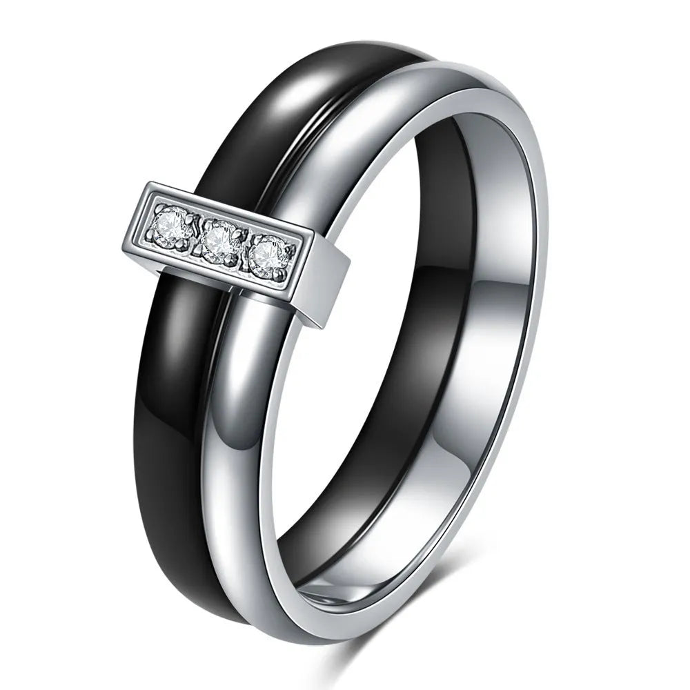Ceramic geometric women's ring with glossy stitching and zirconium elements in steel black colour
