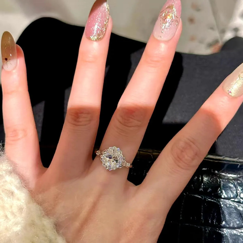 Silver geometric ellipse ring with diamond treatment and adjustable opening mechanism