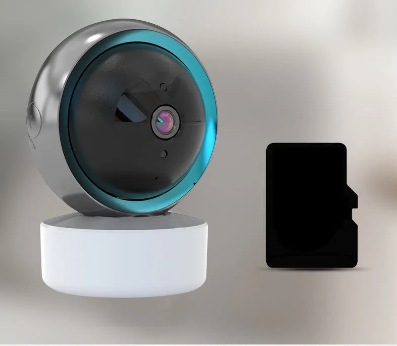 Indoor 360 degree rotating WiFi security camera with UK power plug on white background