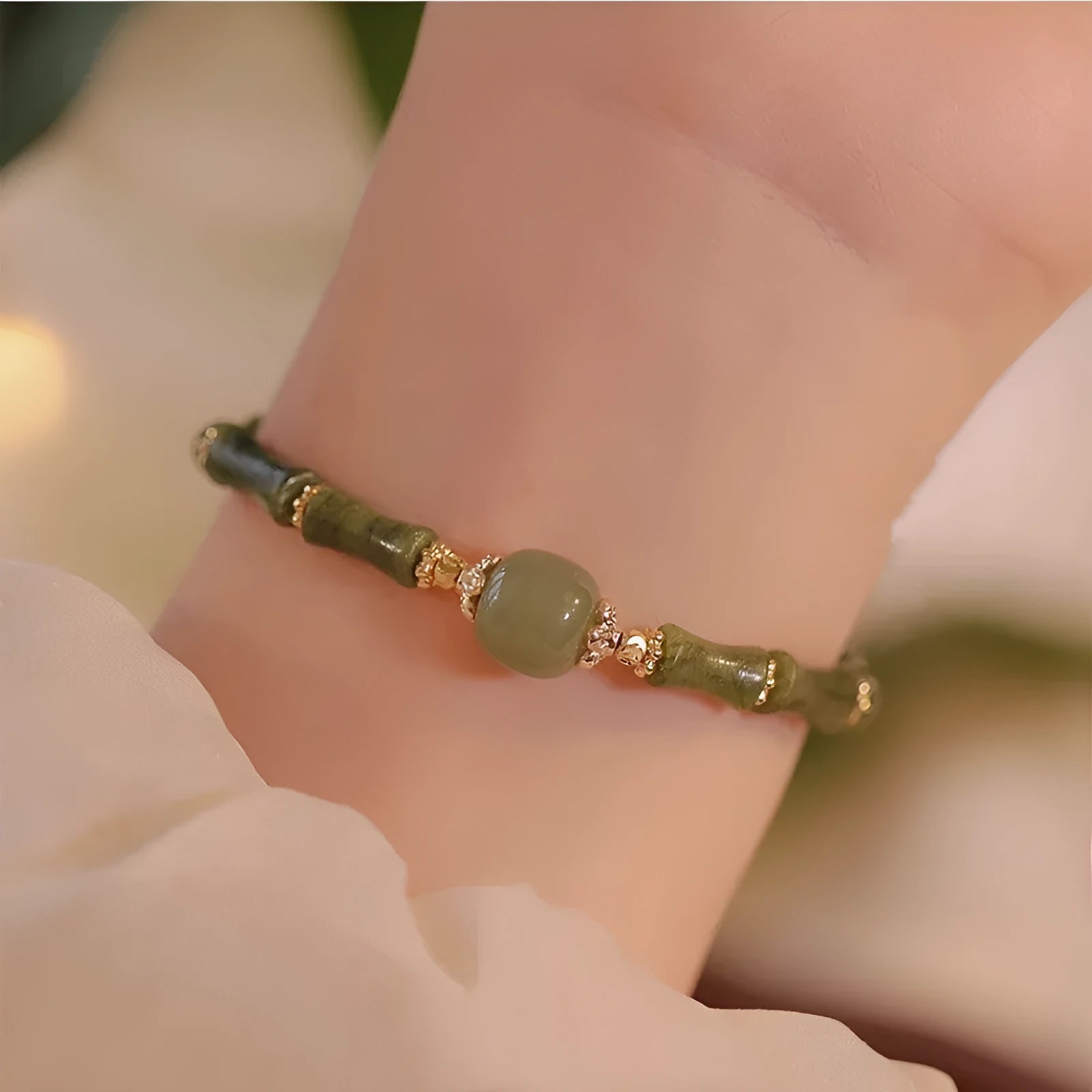 Dark green Hetian jade bracelet with geometric bamboo festival design on wrist