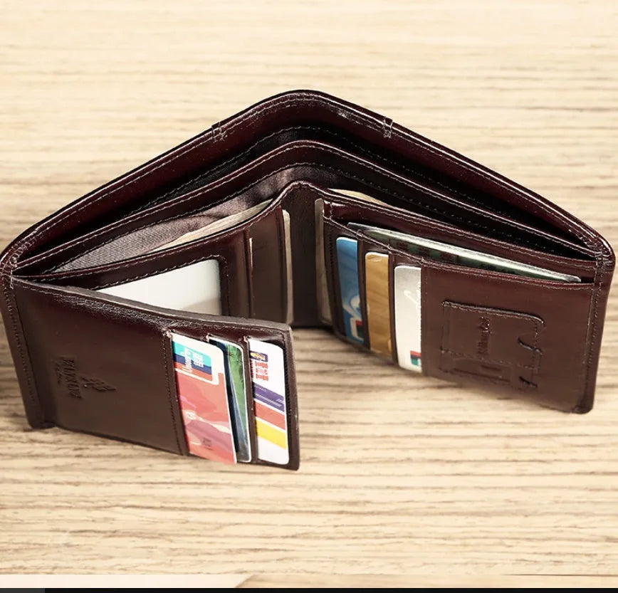 Men's leather wallet open showing card slots, coin pocket, photo window, and document holder in black or brown