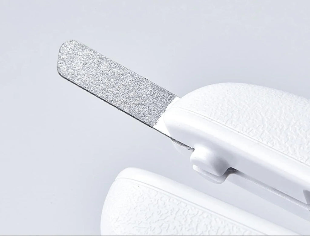 White pet nail clippers with LED light, anti-splash guard, and leather-like handle.