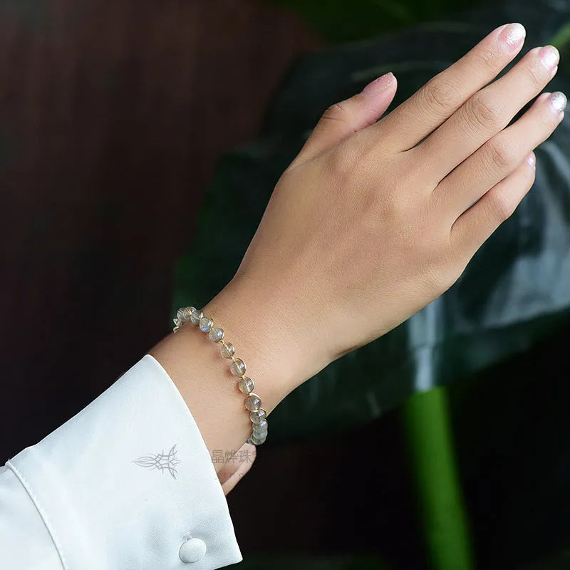 Women's crystal bracelet with 6mm blue moonstone and 14K gold gilded metal detailing