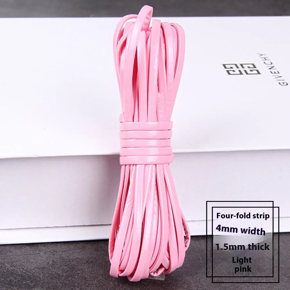 Coiled PU leather woven craft string in multiple colours including beige, black, red, blue, green, gold, and silver.