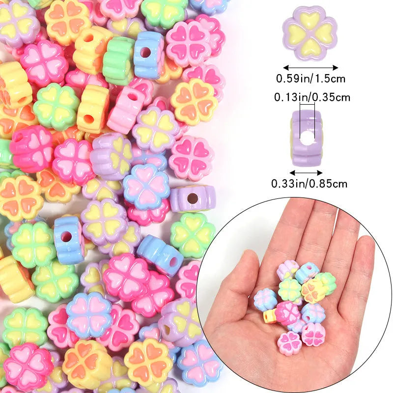 15mm acrylic four-leaf clover beads with frosted finish in light colours including pink, yellow, green and blue